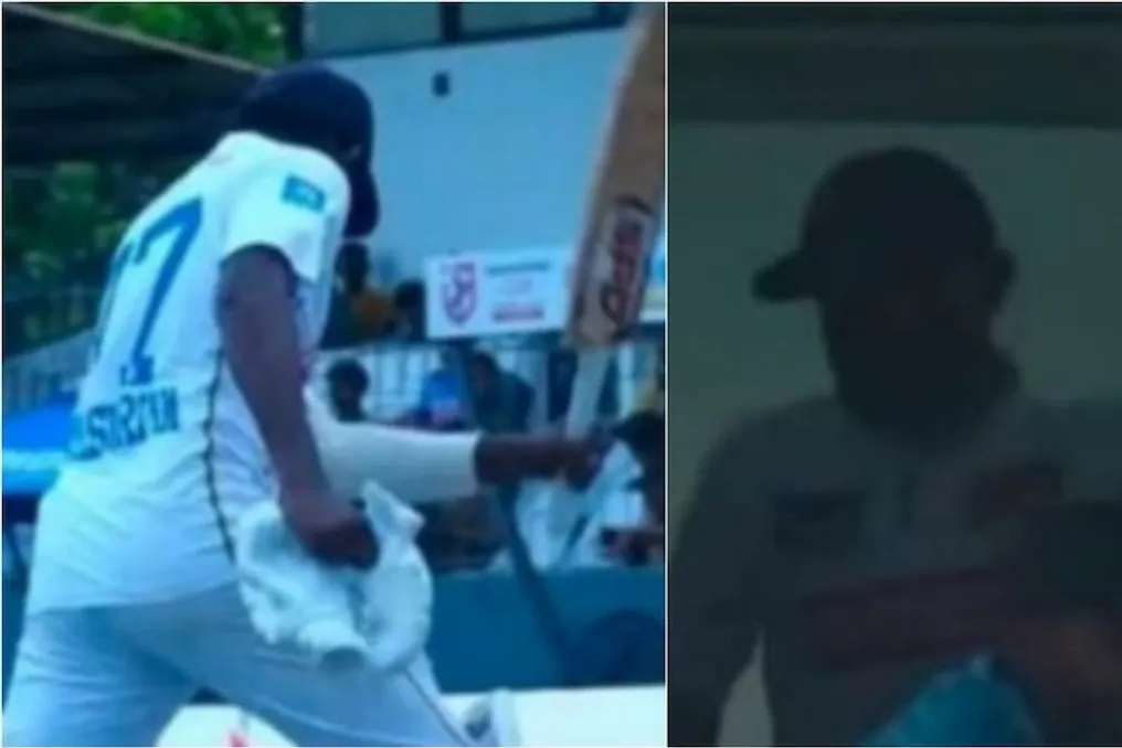 Jogador do Sri Lanka faz cena após decisão do árbitro, batendo no barreira com um bastão